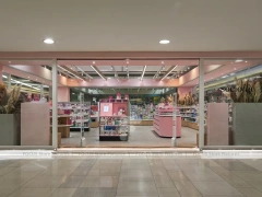 Pink Arched Cosmetics Boutique with Seating Area