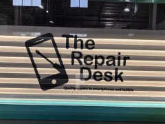 Turquoise Repair Desk Logo Wall Panel