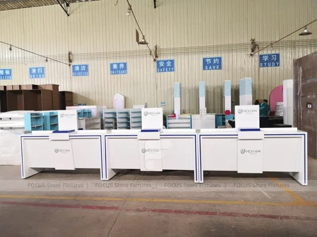 White Blue Laptop Phone Display Counter