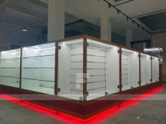 White Glass Kiosk Counter With Red LED Base