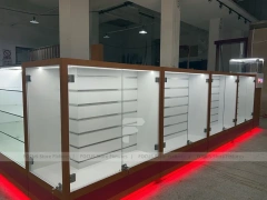 White Glass Kiosk Counter With Red LED Base