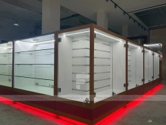 White Glass Kiosk Counter With Red LED Base