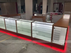 White Glass Kiosk Counter With Red LED Base