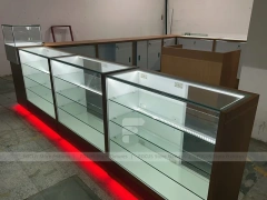 White Glass Kiosk Counter With Red LED Base