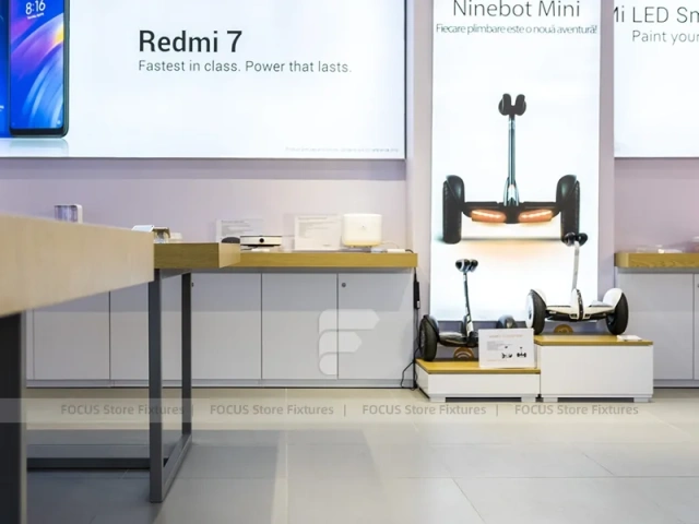 White Redmi Phone Display Wall And Table