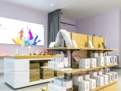 White Redmi Phone Display Wall And Table
