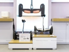 White Redmi Phone Display Wall And Table