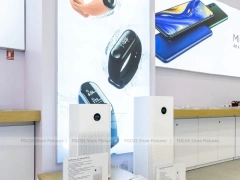 White Redmi Phone Display Wall And Table