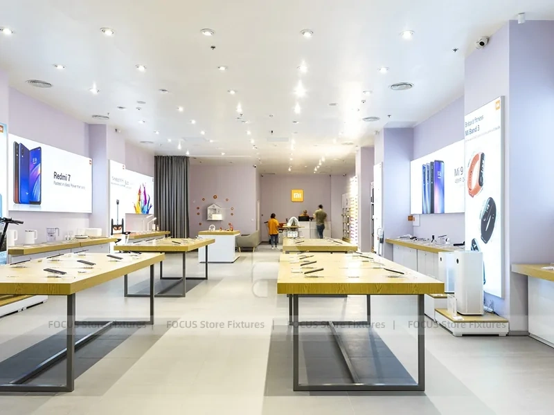White Redmi Phone Display Wall And Table
