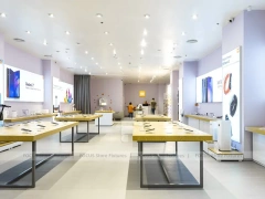 White Redmi Phone Display Wall And Table
