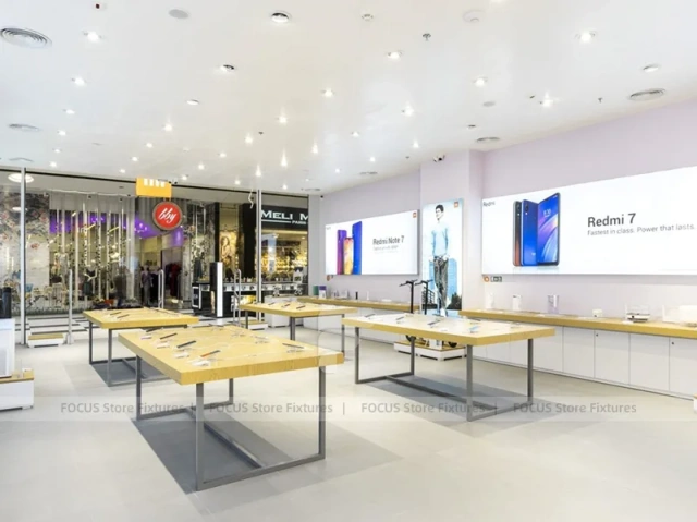 White Redmi Phone Display Wall And Table