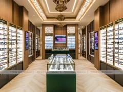 Amber Oak Eyewear Showcase Room with Emerald Demo Island