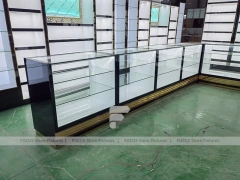 Black Branded Perfume Wall System With Glass Islands
