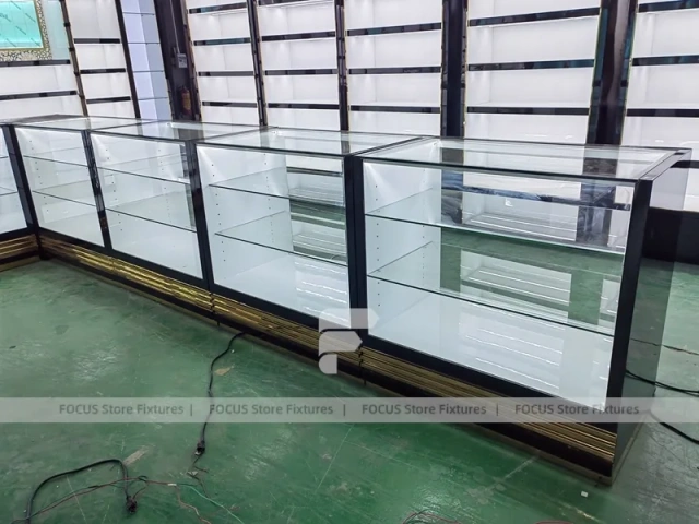 Black Branded Perfume Wall System With Glass Islands