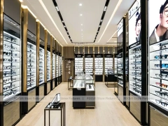 Black Frame Eyewear Display Hall with Central Demo Tables