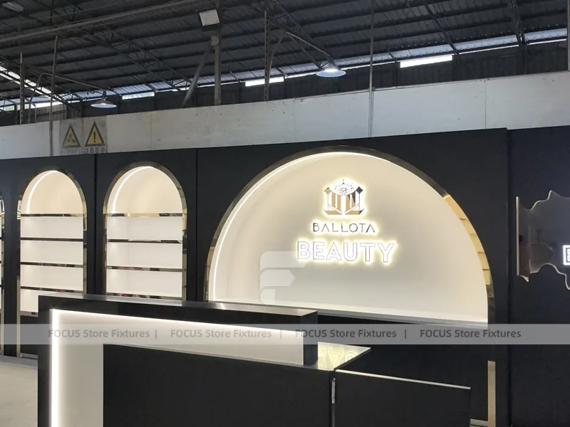 Black Perfume Arch Logo Display Wall