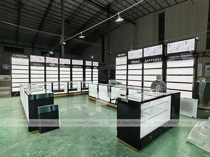 Black White Perfume Wall Layout With Center Islands