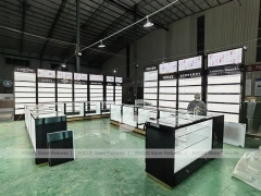 Black White Perfume Wall Layout With Center Islands
