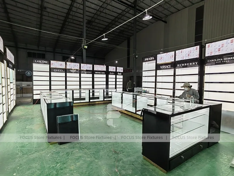 Black White Perfume Wall Layout With Center Islands