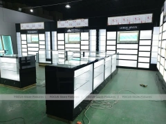 Black White Perfume Wall Layout With Center Islands