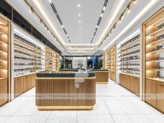 Blush Accent Optical Boutique Layout with Center Island Showcase
