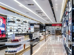 Bright Perfume Aisle Layout With Gold Trim