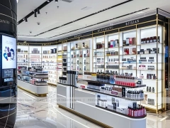 Bright Perfume Aisle Layout With Gold Trim