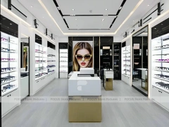 Bright White Eyewear Boutique Interior with Corner Showcase Layout