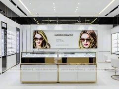 Bright White Optical Wall Display with Corner Showcase Layout