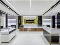 Bright White Optical Wall Display with Corner Showcase Layout