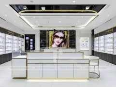 Bright White Optical Wall Display with Corner Showcase Layout