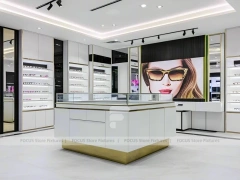 Bright White Optical Wall Display with Corner Showcase Layout