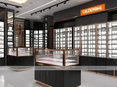 Charcoal Copper Eyewear Retail Interior with Copper-Framed Cases