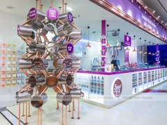 Color Burst Confectionery Boutique Layout with Rainbow Aisle Shelving
