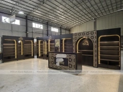 Dark Perfume Wall Shelving With Gold Arch Frames