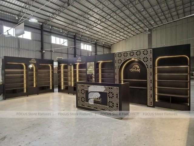 Dark Perfume Wall Shelving With Gold Arch Frames