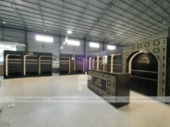 Dark Perfume Wall Shelving With Gold Arch Frames