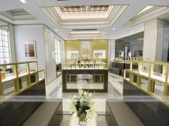 Elegant Cream Perfume Boutique With Illuminated Cabinets