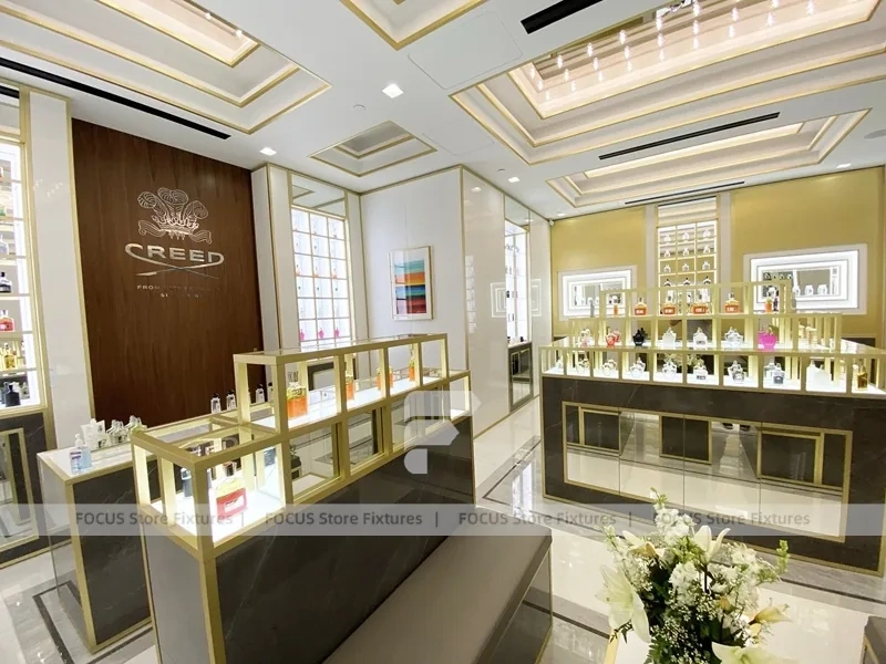 Elegant Cream Perfume Boutique With Illuminated Cabinets