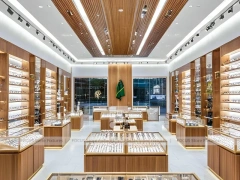 Elegant Woodgrain Eyewear Showroom with Boutique Browsing Aisle