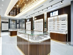 Elegant Woodgrain Vision Store Interior with Boutique Browsing Aisle