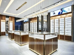 Elegant Woodgrain Vision Store Interior with Boutique Browsing Aisle
