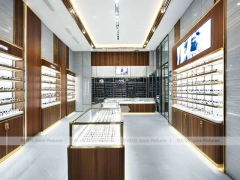 Elegant Woodgrain Vision Store Interior with Boutique Browsing Aisle