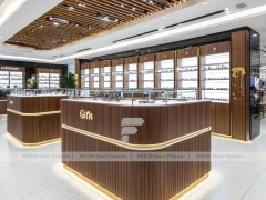 Flagship Walnut Eyewear Retail Gallery with Branded Feature Counter