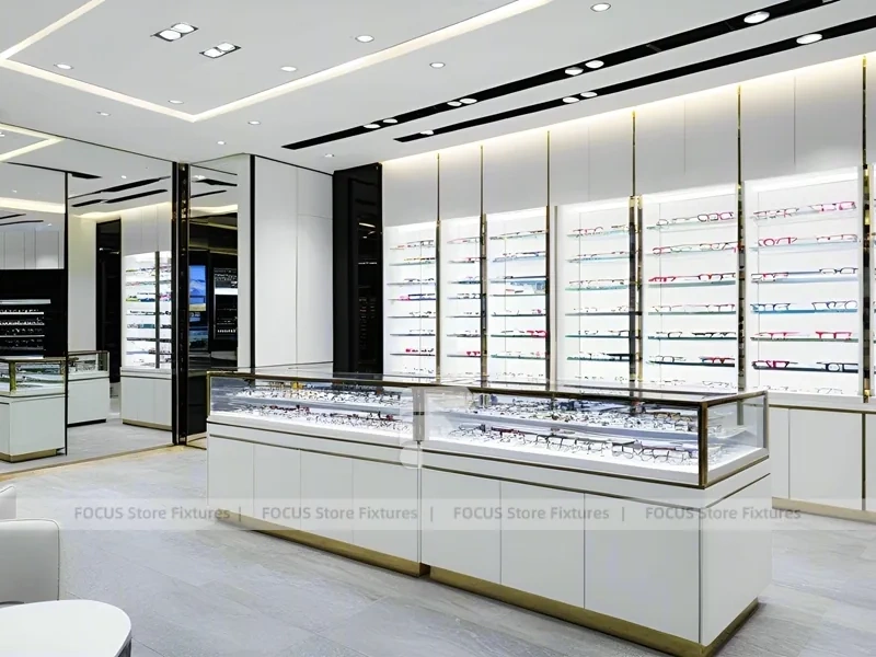 Glossy White Eyewear Boutique Interior with Gold Accent Counter