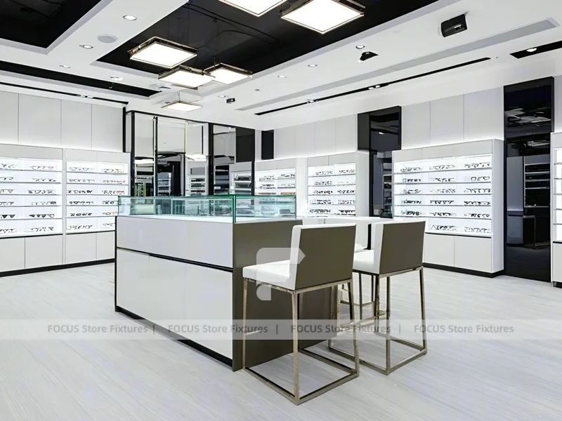 Glossy White Eyewear Boutique Interior with Gold Accent Counter