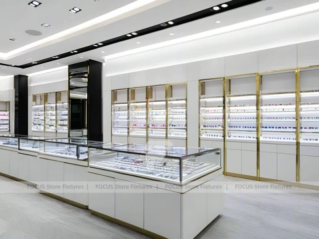 Glossy White Eyewear Boutique Interior with Gold Accent Counter