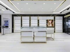 Glossy White Vision Retail Display with Gold Accent Counter
