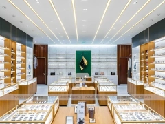 Gold Accent Optical Boutique Layout with Feature Counter Ensemble