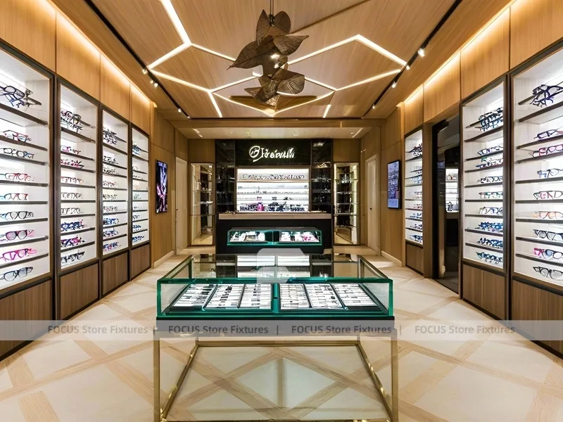 Gold Accent Optical Gallery Interior with Emerald Demo Island